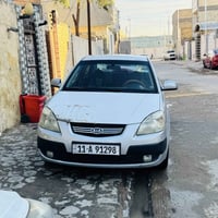 كيا ريو 2009  محرك 1600 باسمي  السعر الاتصال بلرقم  07802493878