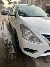 نيسان سني هندي 23  ماشيه63 الف  ضربه خفيفه بالباب السايق والخلفي  سيار...