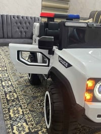 سيارة أطفال • شكل شرطة • عمر ٥-٨