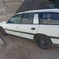 للبيع اوبل اوميكا بزون استيشن موديل ١٩٩٦ رقم بغداد انكليزي سياره جاهزه...