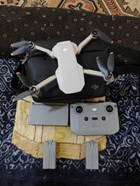 DJI Mini 2 • حالة ٩٥٪ • دبل بطارية