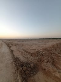 ٢ دونم إلا ربع • واجهة ٢٧م • شارع عرض ٨م