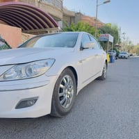 جنسس ٢٠٠٩ • ابيض صدفي • محرك ٣٨٠٠