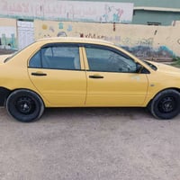 لانسر موديل 9 • انكليزي • رقم بغداد