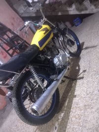 دراجة نارية • بصرة كزيزة