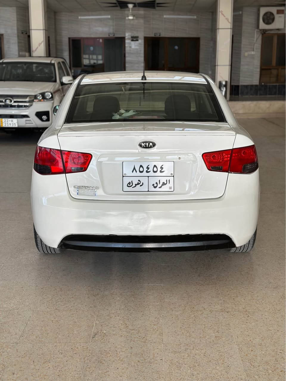 كيا سيراتو لون أبيض موديل 2012  صبغ بها قطعتين ربع رقم وسنويه منتهي كير ومحرك نظيف غرامات بها 100 دولار سيارة موجود زاخو تلفون *********** زاخو, دهوك
