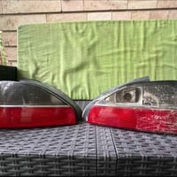 بك لايت بيجو  306 اصلي موديل 2001 اليسار كامل واليمين الجام مكسور اثني...