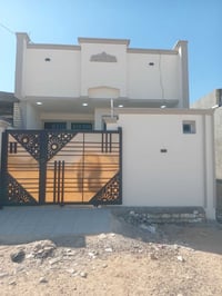 الفلوجة حي الشهداء • ١٢٥م • مشتمل طابق ونصف