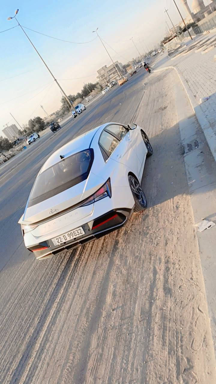 هيونداي النترا 2024 (خليجي - تجميع صيني) - فول مواصفات 1/1 💎
​السيارة بحالة الوكالة (ماشية 70ألف كم فقط) وكفالة عامة   ( السونار مرفق مع المنشور وشرط الفحص).
​📌 أبرز المواصفات:
​المحرك والكير: محرك وكير شرط الفحص (كير طيارة). محرك15000دبل نوزل 
​أنظمة القيادة: 4 مودات قيادة (Eco, Comfort, Smart, Sport).
​المظهر والاضاءة: لايت LED نهاري + زنون عالي ناصي (3 عدسات) + ويل رياضي حجم 17.
​الداخلية والراحة: فتحة سقف (سلايد) + مقاعد جلد أسود + ستيرن رياضي + تبريد قطعتين (ثلج 🥶) + شاشة أصلية وعداد ديجيتال.
​الأمان والأنظمة: 6 إيرباك (دشبول، دركة، تكم، مقاعد) + سايد بريك كهربائي (بصمة) + حساسات خلفية وكاميرا + كروز سرعة وتحكم ستيرن فول.
​التحكم: بصمة تشغيل وبصمة أبواب + مري شفط كهرباء مع إشارات.
​💸 السعر: 138 ورقة (وبيها مجال بسيط للشراي الطيب).
📍 الموقع: بغداد - البياع / الشرطة الخامسة. او منطقه حي العامل 
​📞 للتواصل والاستفسار:
​اتصال ***********
