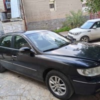 ازيرا 2010 محرك 2700 سته سلندر  كرسي السايق كهرباء تدفئة كراسي  السيار...