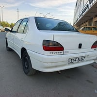 سلام وعليكم عندي بيجو ٣٠٦للبيع سيارة جديدة وما ماشية مكاني بغداد للاست...