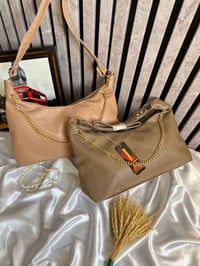 حقيبة نسائية • اكسسوار