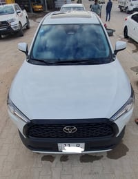 كورولا كروس ٢٠٢٤ للبيع السيارة مكفولة من كل شي ، محركها ٢٠٠٠ هايبرد ، ...