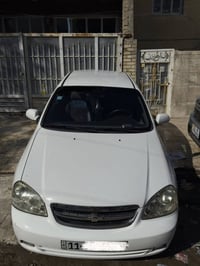 اوبترا 2012 رقم بغداد ماشيه 95 الف  سعر 90 $ هاتف 07712370111