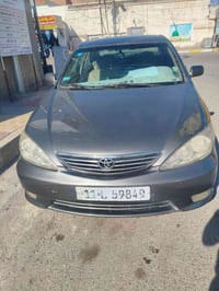 مكلف بالنشر  كامري 2003 صبغ عام مكفوله عدى جاملغ خلفي وطخه بسيطه بدون ...