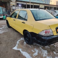 للبيع او مراوس لانسر 2010 الشركة العامه حره كير عادي مكينه 2000 مكفوله...