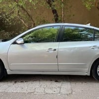 نيسان التيما   2008  رقم بغداد تحويل مباشر بسمي   مكينه وكير محور كامر...