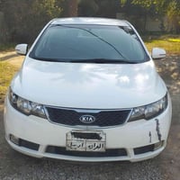 كيا سيراتو 2012 محرك 1600  بيها 4 قطع صبغ بدون دواخل  رايدها ب90 وبيها...