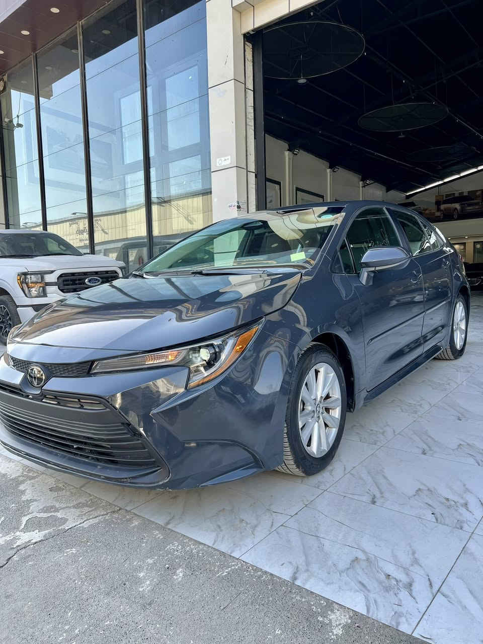 تويوتا كورلا موديل 2025
فئة ياباني LE
لون سمنتي 🩶
ماشيه 3 ميل فقط ( زيرو )

بونيد صبغ فقط 🔻( بدون دواخل ) ✅
ايرباكات ستيرن سستيم شركة ✅
رقم الشاصي داخل المنشور 👇

مواصفات ♻️
بصمة تشغيل
بريك بصمة
داخل لونين
رادار امامي 
موبايل شحن
￼ويل كب
تحديد سرعة
تحديد مسار
تحكم ستيرن جهتين 
كروس سرعه 
تبريد نظام Eco
نظام اقتصاد بانزين Eco
واي فاي 
شاشة كار بلي لمس 
كامره خلفية
رادار توقف 
توقف ذاتي 

سعر 145 ورقة - بدون رقم ( تترقم شمالي )
للاستفسار واتساب ☎️ *********** 📞
العنوان / معرض اربيل كارس / شارع 100 داخل معارض
