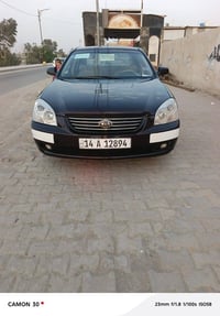 كيا أوبتما خليجي لون كرزي موديل2008 رقم أنگليزي بسمي سنويه لل 31 السيا...