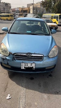 اكسنت  للبيع خليجي موديل 2010 محرك 1600 مصبوغة حزام اثر جراد رقم بغداد...