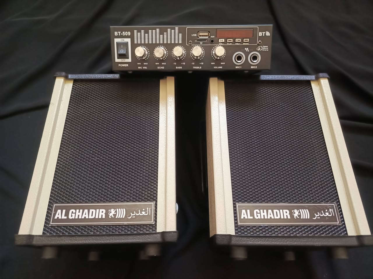 منظومة الغدير الصوتية AL GHADIR BT-509
جودة تسمعها... وقوة تثق بها
إذا كنت تبحث عن منظومة صوت تجمع بين القوة، النقاء، وسهولة الاستخدام، فإن AL GHADIR BT-509 هي الخيار الأمثل لكل من يريد أداءً احترافيًا بسعر اقتصادي.
✨ أبرز المميزات:
🎙️ يدعم مايكروفونين في آنٍ واحد مثالي للخطباء، الرواديد، المحاضرين، والمناسبات المختلفة.
📱 بلوتوث سريع ومستقر اربط هاتفك خلال ثوانٍ واستمتع بتشغيل اللطميات، القرآن الكريم، المحاضرات أو أي ملفات صوتية دون الحاجة إلى أسلاك.
💾 تشغيل مباشر من USB وذاكرة TF يكفي إدخال الفلاش أو كارت الذاكرة ليبدأ التشغيل فورًا.
🎚️ تحكم احترافي بالصوت
رفع وخفض صوت المايك.
خاصية الصدى (Echo) لإعطاء الصوت رونقًا وجمالًا.
التحكم بالجهير (Bass) للحصول على صوت عميق.
التحكم بالحدة (Treble) لصوت أكثر نقاءً.
التحكم الكامل بمستوى الصوت العام.
🔊 سماعتان من AL GHADIR مصممتان لتقديم صوت واضح، قوي، ومتوازن مع توزيع ممتاز للصوت في المكان.

للاستفسار والاتصال التواصل خاص او على الرقم ‏‪***********‬‏ 📞📞
