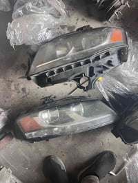 عندي لايتات اودي A4 اصليات تفصيخ جامتهن نضيفه بس وصاخه عليهن مو صفار 0...