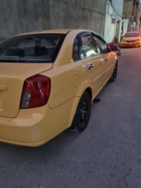 اوبترا ٢٠١١ شركة عامة رقم بغداد باسمي بدون حادث جاهزة من كل شي كير محر...