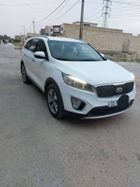 كيا سورنتو رقم بغداد باسمي موديل ١٦ خليجي  ٦سلندر ٧ راكب ماشية ١٠٦ كشن...