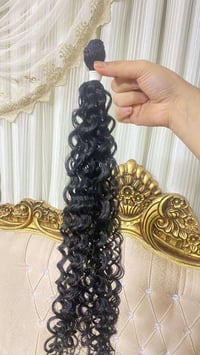 وصلات شعر • أسود مموج • ٧٥سم