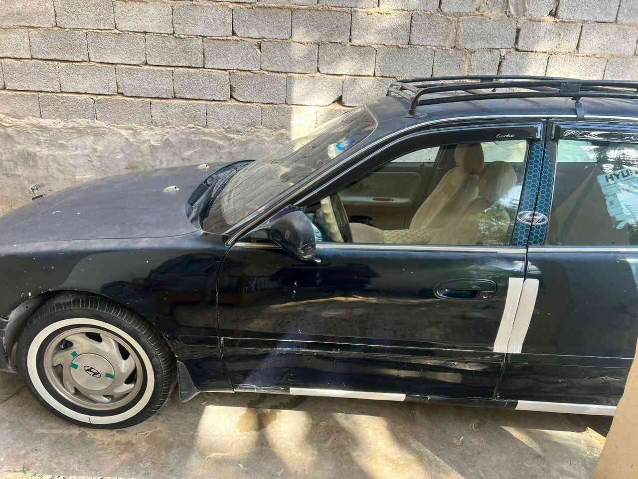 سوناتا تو موديل ٩٤ رقم بغداد مشروع وطني سنويه باسمي 
سياره مال جناي  ٣٦ وبيها مجال رقمي ***********
