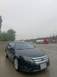 فورد فیوژن 2010 se  سەیارەکە دو پەڵەی بۆیاخە شوێن تەکیە نرخ 80 $ ژم 07...