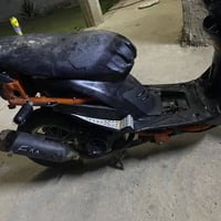 مكينة ٤٩ • دراجة رمادي