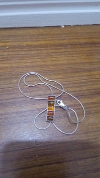 زنجيل • فضة ٩٢٥ • حجر كهرب