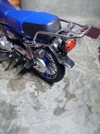 دراجه ايراني 25 كفاله من كلشي ما بيها نقص برقي شاشه بلاتوث، وتشتغل صور...