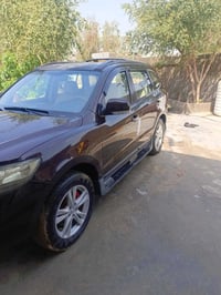 سنتافي 2008 السيارة سبع راكب    3قطع تبريد  وكير ومكينة بحالة جيدة الس...