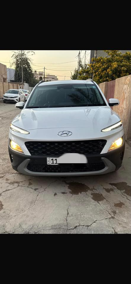 كونا 2023 لون ابيض مرقمة بغداد
ماشية 30 الف ميل
محرك 2000
حادثها بارد بالجنطة + الدعامية الخلفية مبدلة
بدون صبغ
بدون دواخل
ايرباك سليم 
كير مكينة مكفولات 

السيارة فول للاخير 

دفع رباعي 
شاشة كبيرة
بصمة
تشغيل عن بعد 
كشنات جلد و بيهن تدفئة
ستيرن تدفئة
كامرة خلفية دوارة
فتحة سقف
رادارات
مثبت سرعة
تحديد مسار
اشاير بالمري
فول تحكم ستيرن
سايد بريك كهربائي
حساسات امامية 
حساسات خلفية
مستشعر وقوف 
منافذ شحن USB اثنين
اوتو هولد 
مراقبة نقاط عمياء 
دخول ذكي للابواب الامامية
٣ وضعيات قيادة
هذني ابرز المواصفات و اكو غيرهن

سيارة جاهزة و كلش نظيفة مال بنيه استخدام يومي
للاستفسار واتساب ***********
