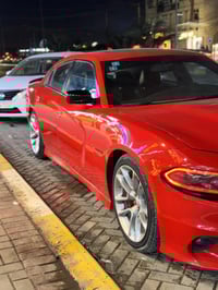 جارجر  لون احمر طماطة موديل 2022   ماشية  61000 ميل  حادث جاملغ ايسر و...