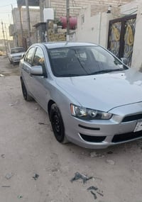 لانسر قرش موديل ٢٠٠٨ تبريد حدادية كهرباء جاهزه من كلشي مكينه ٢٤٠٠ كير ...