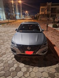 Mg 5 luxury 2024 بێ بۆیاغ   بستێک ساردی هەیە  فول مواسەفات   30km  ڕۆش...