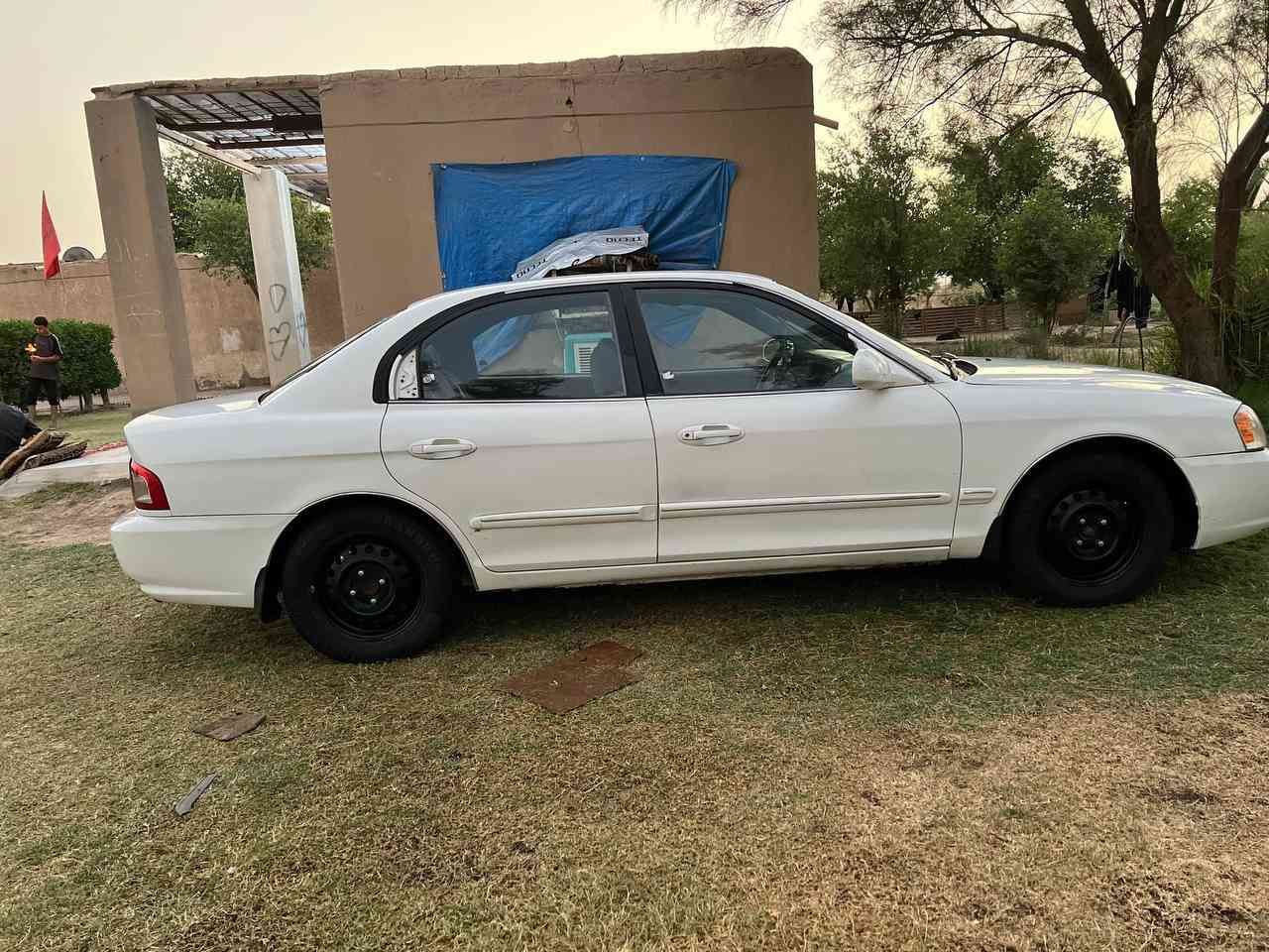 السلام عليكم 
كيا اوبتيما 2006 
 مكينة 6 اسلندر حجم 2700 جديدة حاويه ستوني  شاده رقم بغداد نافذه لغاية 2027 السعر 68 وبيها مجال للطيبين ولاستفسار الاتصال على رقم ***********
