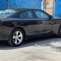 جارجر 2015  sxt بدون حادث وبدون ايرباك صبغ جاملغ خلفي يمين والسونر بال...