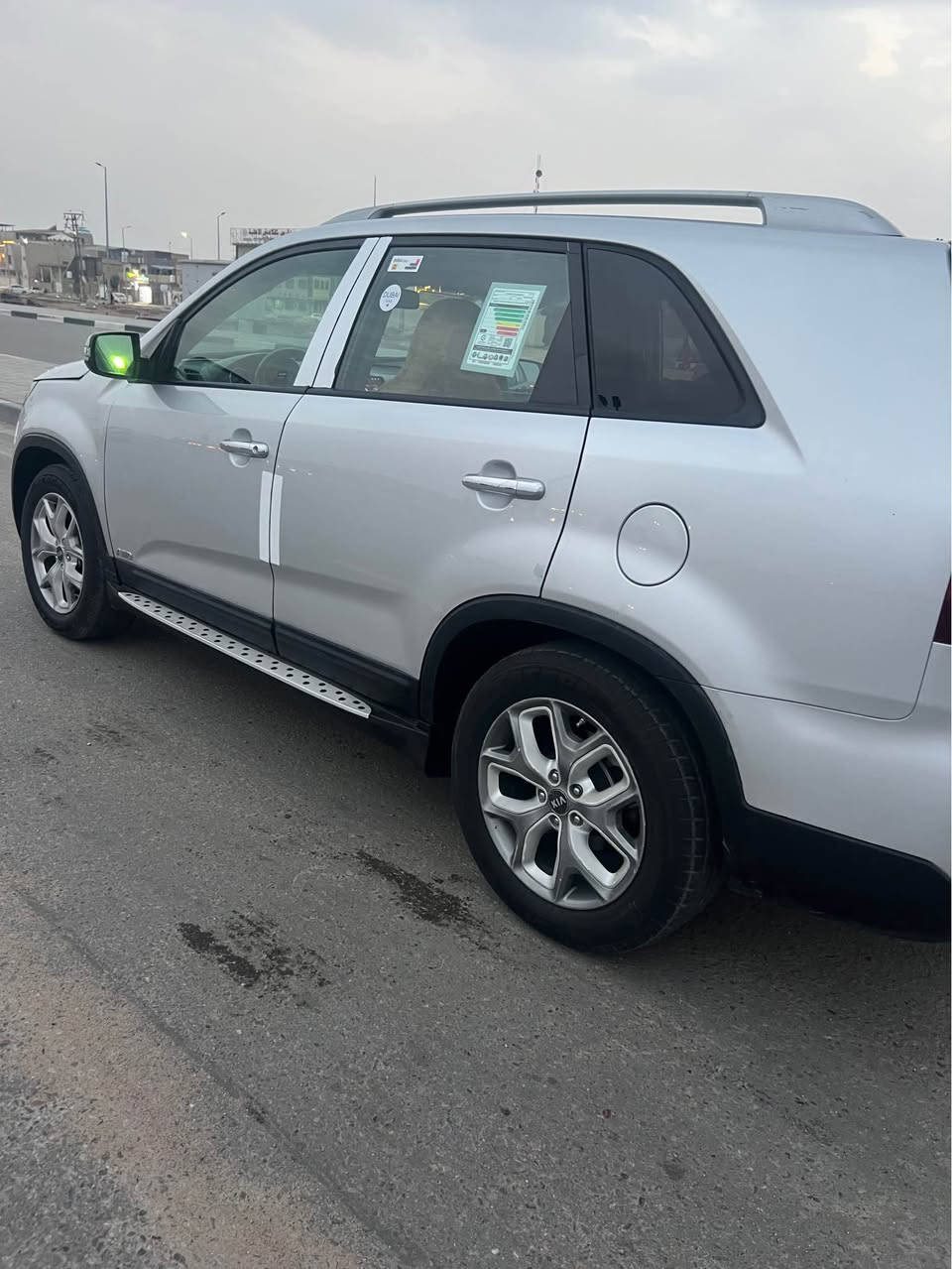 كيا سورنتو 2014  وارد امريكي ضربته جاملغ وبنيد ضربه مو قويه  وبيه مكانات صبغ مكينه وكير كفاله اربعه سلندر  حداده كله جديده كهربائيات كله شغاله  7 راكب  تحكم استيرن وشاشه وكامرا  سياره نضيفه سعر123بيع مستعجل  عنوان المعقل رقم *********** البصرة, العراق
