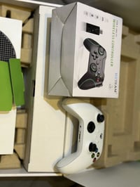 سيريس اكس للبيع مع جوستك وقاعدة شحن استعمال قليل جدا   مكاني بغداد الب...