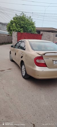 كامري موديل 2003  مراوس صبغ احزام جماليه  رقم بغداد دولي محرك 6 سلندر ...