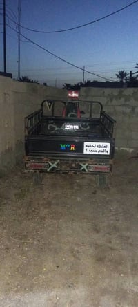 توك توك • أسود • نجف