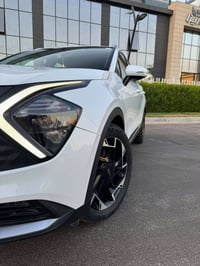اخواني كيا سبورتاج موديل ٢٤خليجي  جنطة كهرباء بصمة تبريد قطعتين  ماشية...