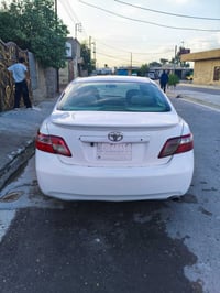 كامري موديل 2007 رقم بغداد سنويه لل2028 كشن كهرباء وجلد فتحه سقف صدر ا...