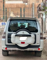 باجيرو 2013 رقم بغداد بيها صبغ تكمة او قمارة او باب مبدلة اثر ضربة جان...