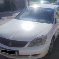سيارة مسيوبوشي لانسر موديل 2010 رقم كربلاء استلام الشركة العامة للسيار...